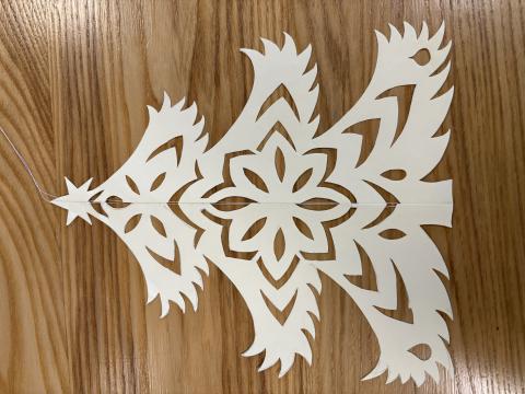 decorative christmas tree cut from paper