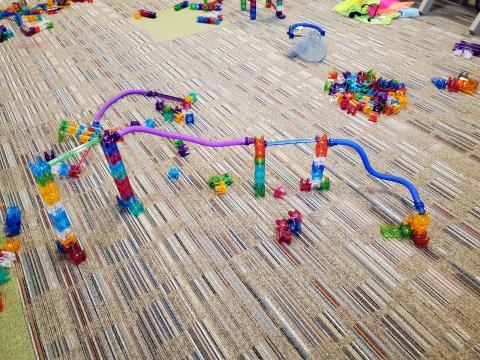 marble run made from plastic tubes and pieces