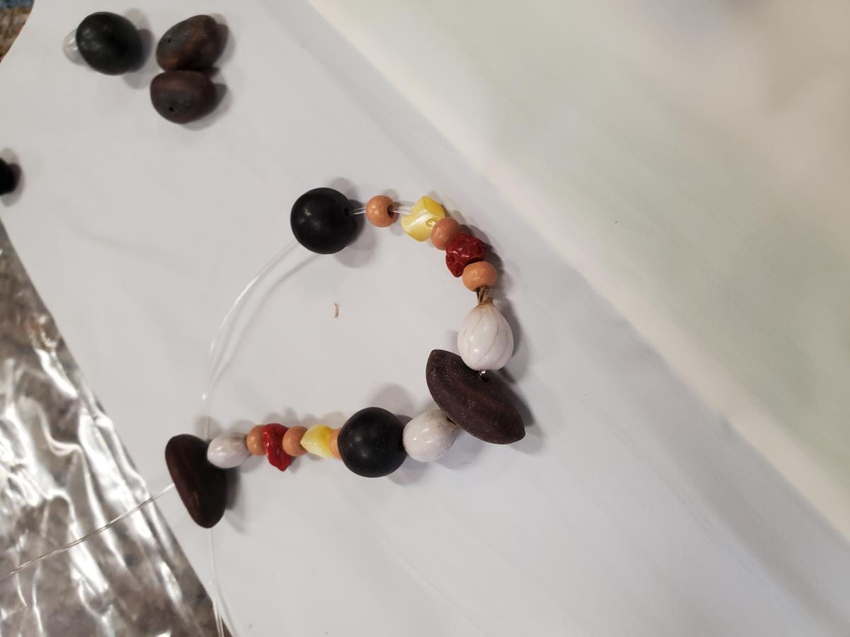 bracelet with seeds, stones and wooden beads