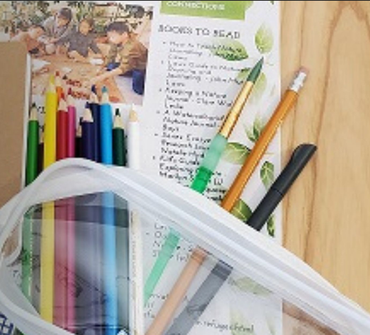 nature journaling - bag with pencils, notebook and pens